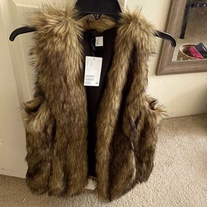 Beautiful vest , brand new with a tag